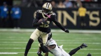 New Orleans Saints wide receiver Rashid Shaheed (22) makes a reception against Jacksonville Jaguars cornerback Christian Braswell (21) during the first half against the New Orleans Saints at Caesars Superdome.