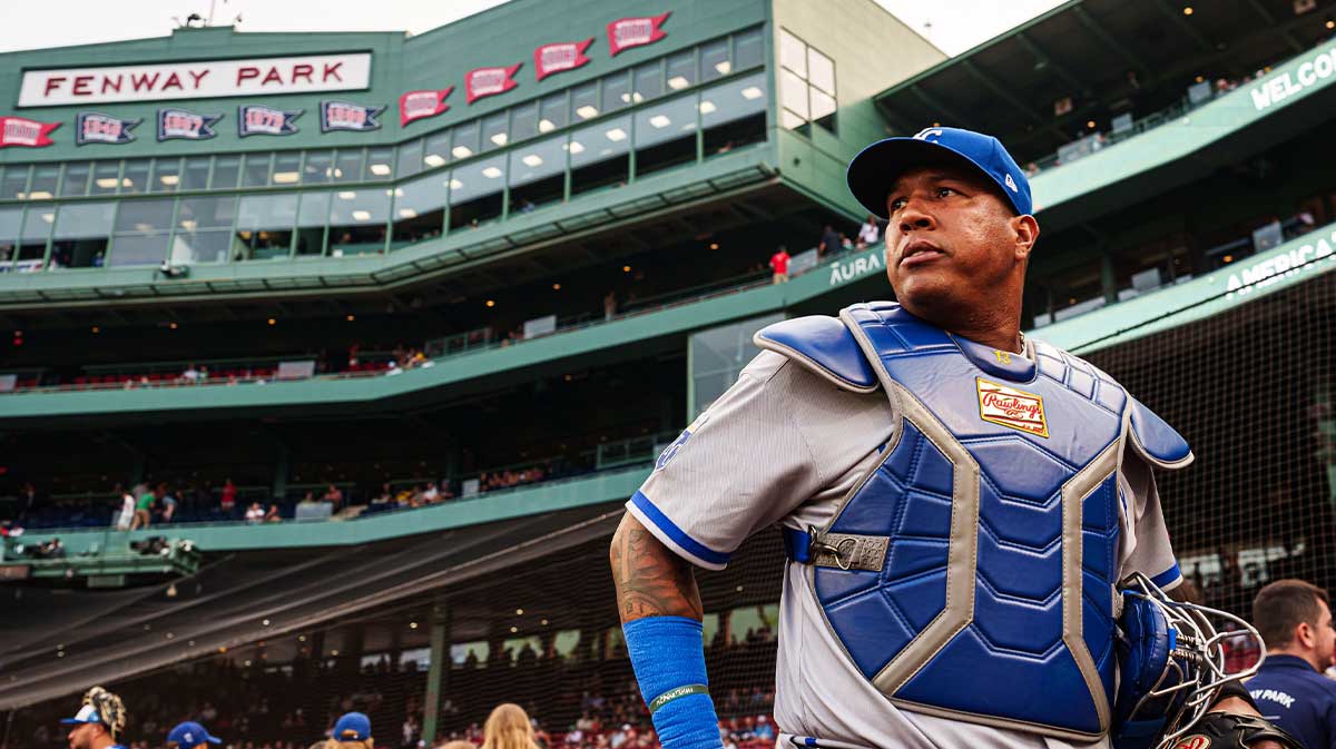 Kansas City Royals catcher Salvador Perez (13) make his way to the bullpen before the start of the game against the Boston Red Sox at Fenway Park.