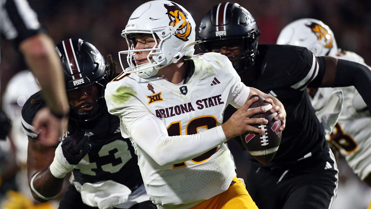 Arizona State Sun Devils quarterback Sam Leavitt (10) scrambles in the backfield as Mississippi State Bulldogs defensive lineman Will Whitson (43) and linebacker Malick Sylla (8) pursue during the second quarter at Davis Wade Stadium at Scott Field.