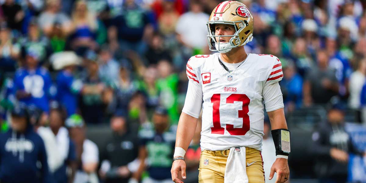 San Francisco 49ers quarterback Brock Purdy (13) reacts following a failed third down play against the Seattle Seahawks during the fourth quarter at Lumen Field.
