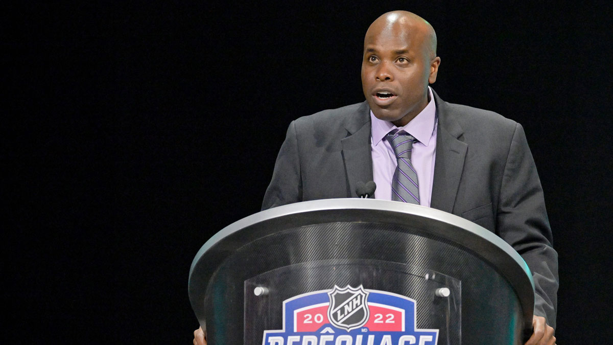 San Jose Sharks general manager Mike Grier gives a speech in memory of former player and scout Bryan Marchment before Filip Bystedt (not pictured) is selected as the number twenty-seven overall pick to the San Jose Sharks in the first round of the 2022 NHL Draft at Bell Centre.