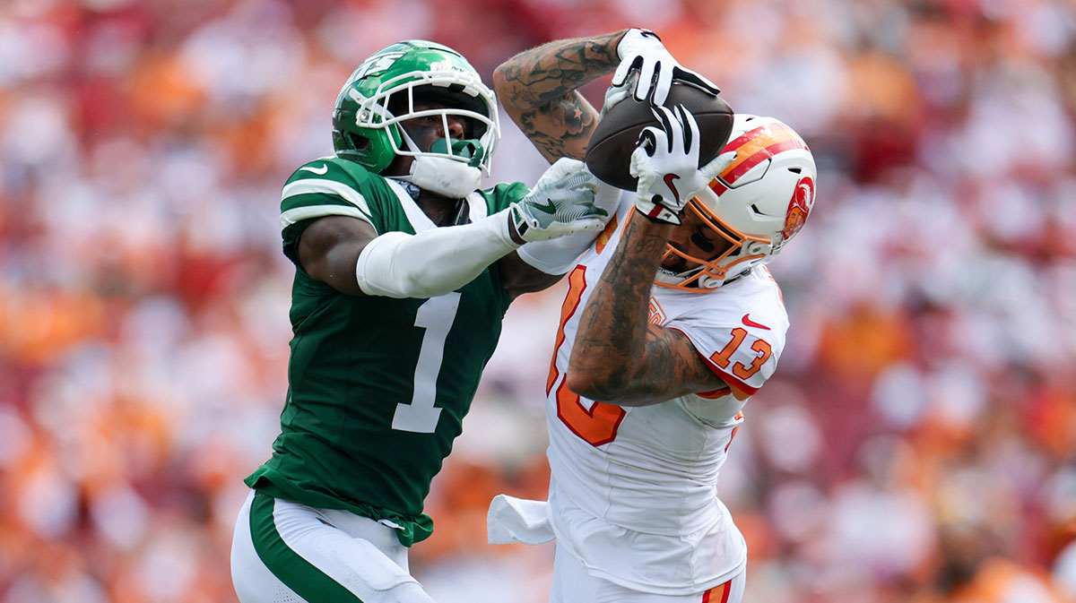 Tampa Bay Buccaneers wide receiver Mike Evans (13) catches pass defended boy New York Jets cornerback Sauce Gardner (1) in the third quarter at Raymond James Stadium. 