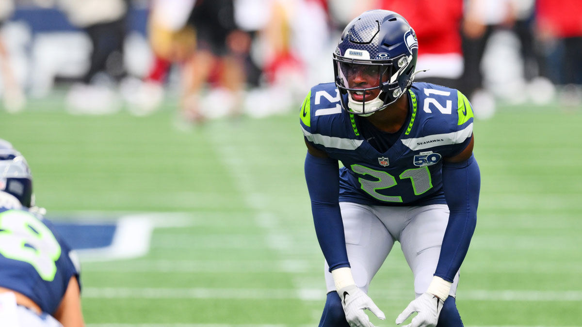 Seattle Seahawks cornerback Devon Witherspoon (21) warms up before the game against the San Francisco 49ers at Lumen Field.