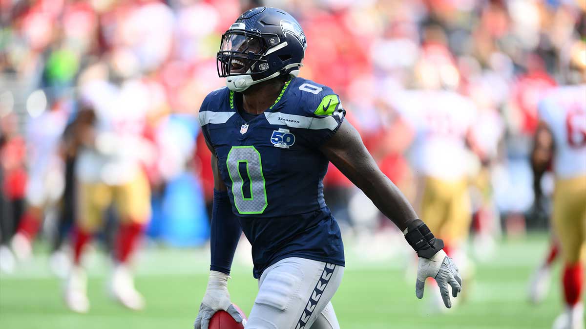 Seattle Seahawks defensive end DeMarcus Lawrence (0) reacts after a play during the second half against San Francisco 49ers at Lumen Field.