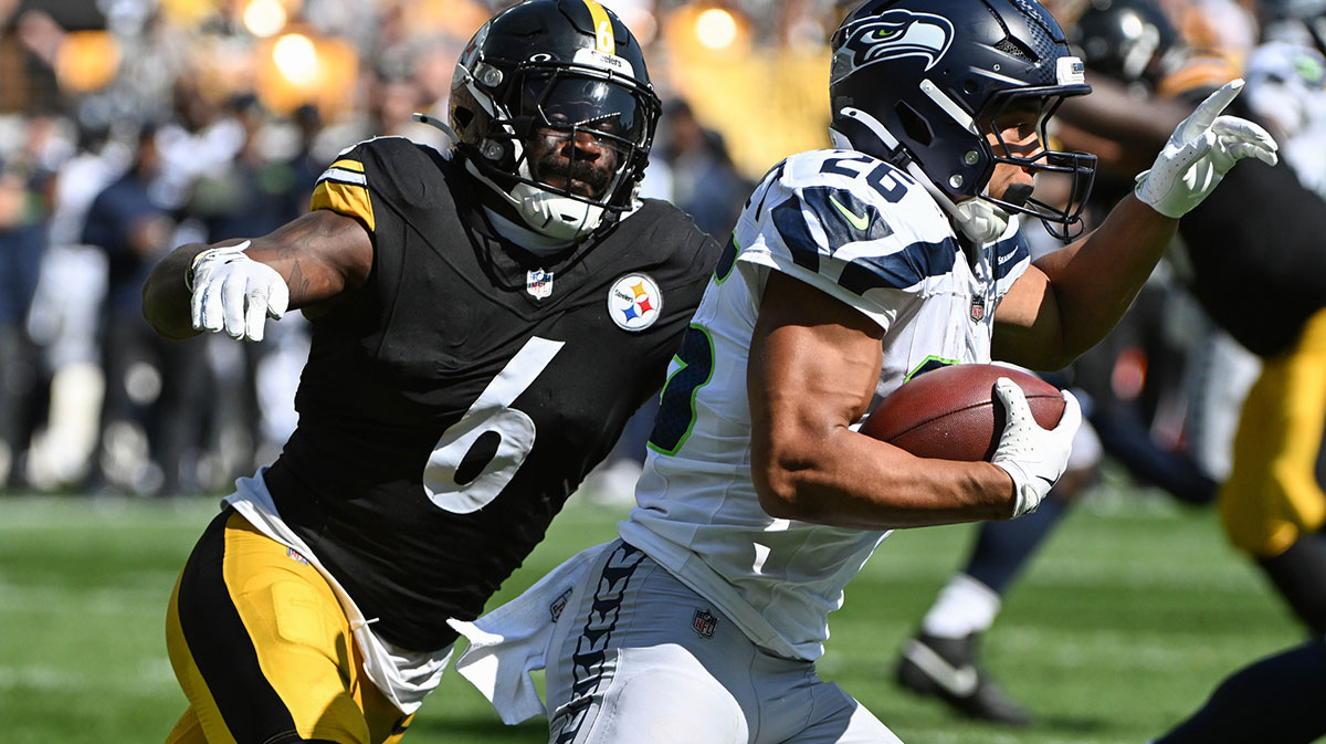 Pittsburgh Steelers linebacker Patrick Queen (6) looks to tackle Seattle Seahawks running back Zach Charbonnet (26) during the second half at Acrisure Stadium