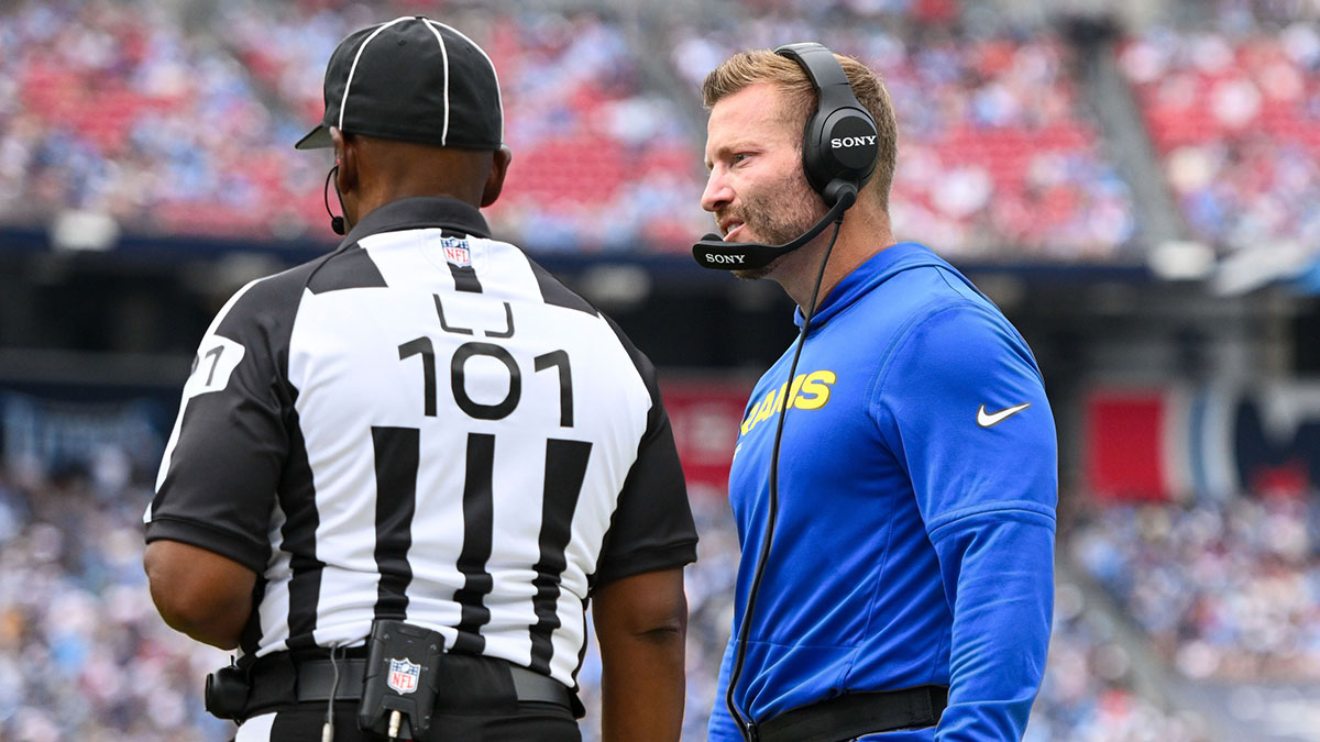 Los Angeles Rams head coach Sean McVay talks with line judge Carl Johnson (101) about throwing the challenge flag against the Tennessee Titans during the second half at Nissan Stadium.