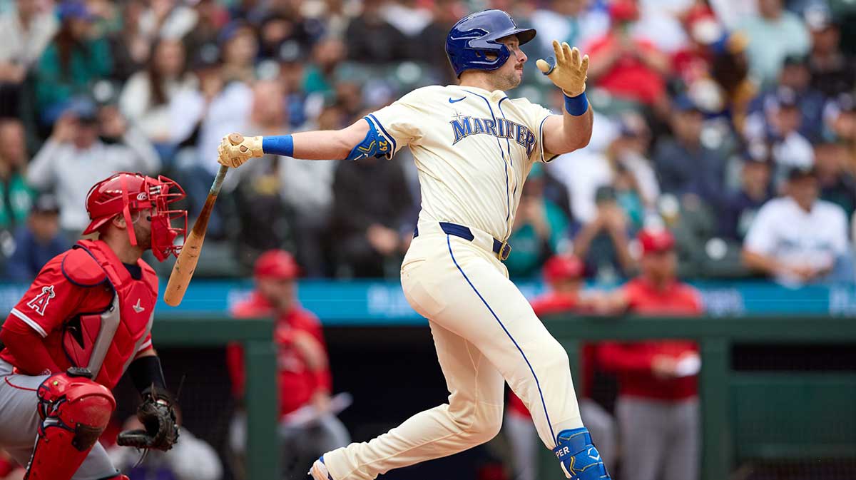 Seattle Mariners catcher Cal Raleigh (29) hits a two-run home run in the inning against the Los Angeles Angels in the first inning at T-Mobile Park.