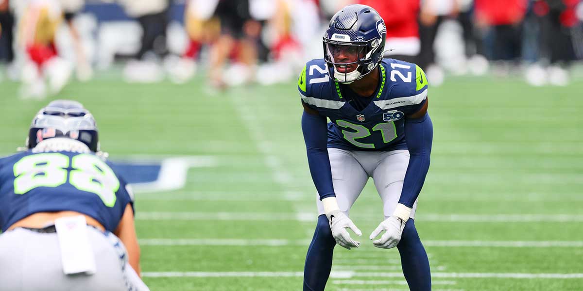 Seattle Seahawks cornerback Devon Witherspoon (21) warms up before the game against the San Francisco 49ers at Lumen Field.