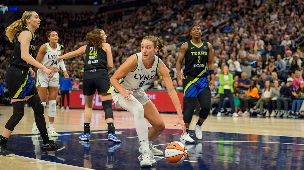 Minnesota Lynx forward Bridget Carleton (6) makes an offensive rebound under the Dallas Wings basket in the first quarter at Target Center.