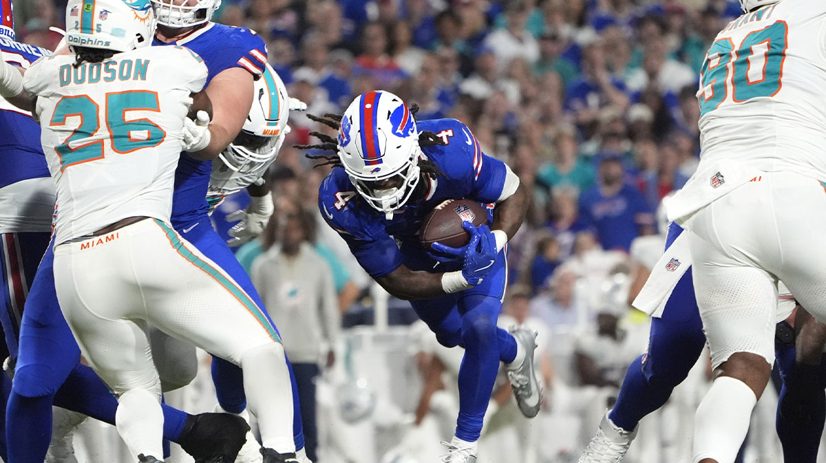 Buffalo Bills running back James Cook (4) runs against the Miami Dolphins in the second half at Highmark Stadium.