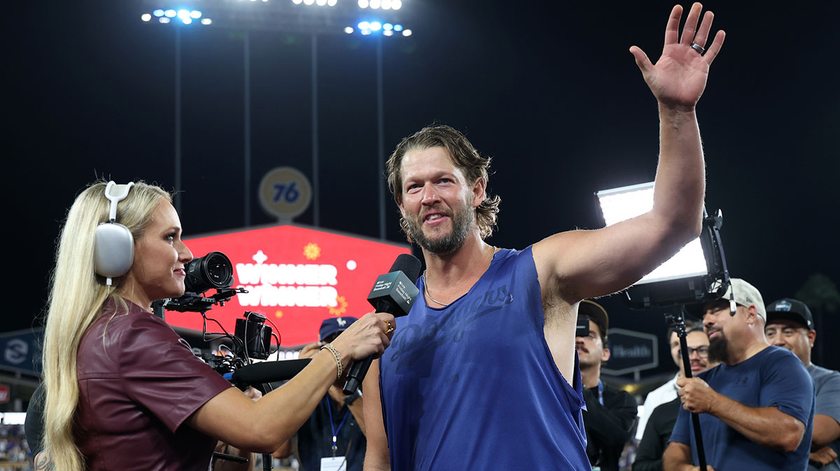Los Angeles Dodgers starting pitcher Clayton Kershaw (22) waves to fans during the post game interview after defeating the San Francisco Giants 6-3 at Dodger Stadium.