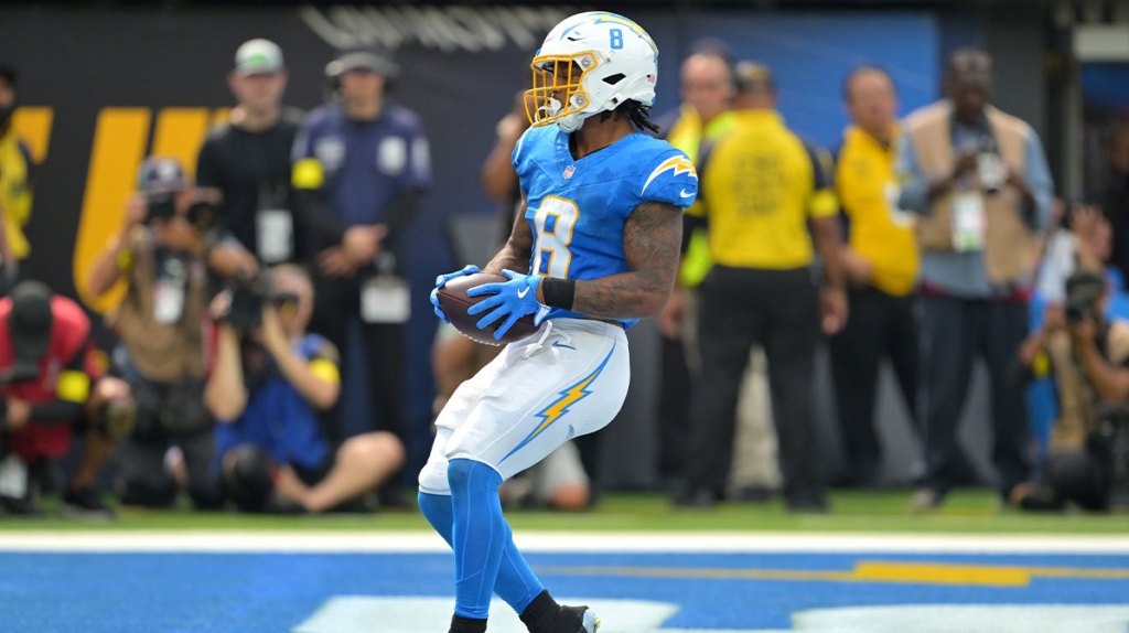 Los Angeles Chargers running back Omarion Hampton (8) runs for a touchdown in the first half against the Denver Broncos at SoFi Stadium.
