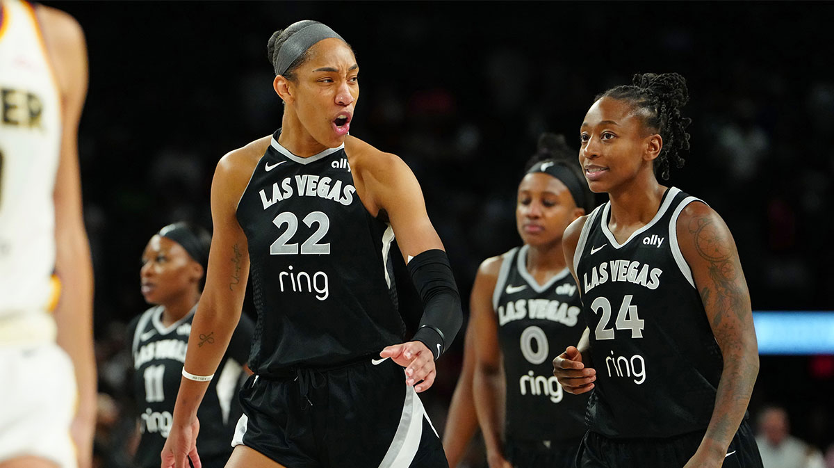 Las Vegas Aces center A'ja Wilson (22) celebrates with Las Vegas Aces guard Jewell Loyd (24) near the end of an overtime period against the Indiana Fever during game five of the second round for the 2025 WNBA Playoffs at Michelob Ultra Arena.