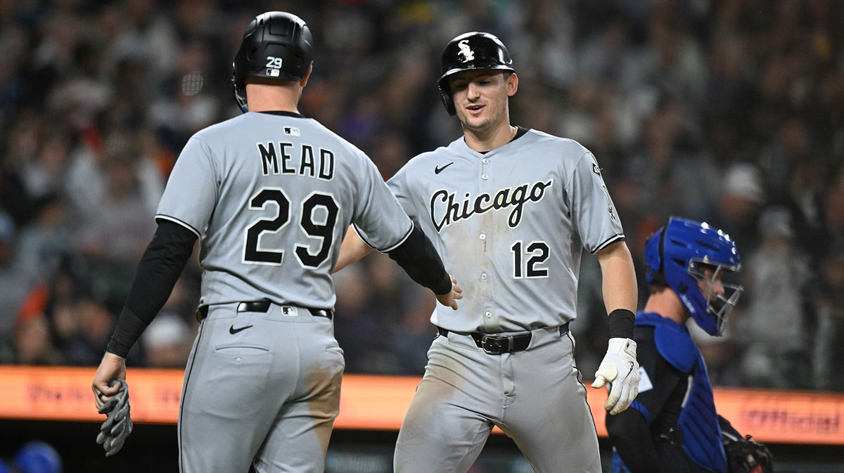 Chicago White Sox shortstop Colson Montgomery (12) celebrates with first baseman Curtis Mead (29) after hitting a two-run home run against the Detroit Tigers in the seventh inning at Comerica Park.