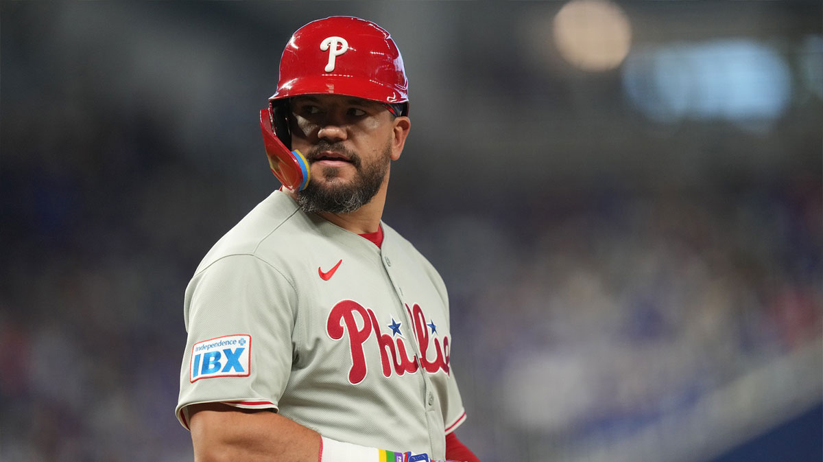 Philadelphia Phillies designated hitter Kyle Schwarber (12) looks back after getting hit by a pitch in the seventh inning against the Miami Marlins at loanDepot Park. Mandatory Credit: Jim Rassol-Imagn Images