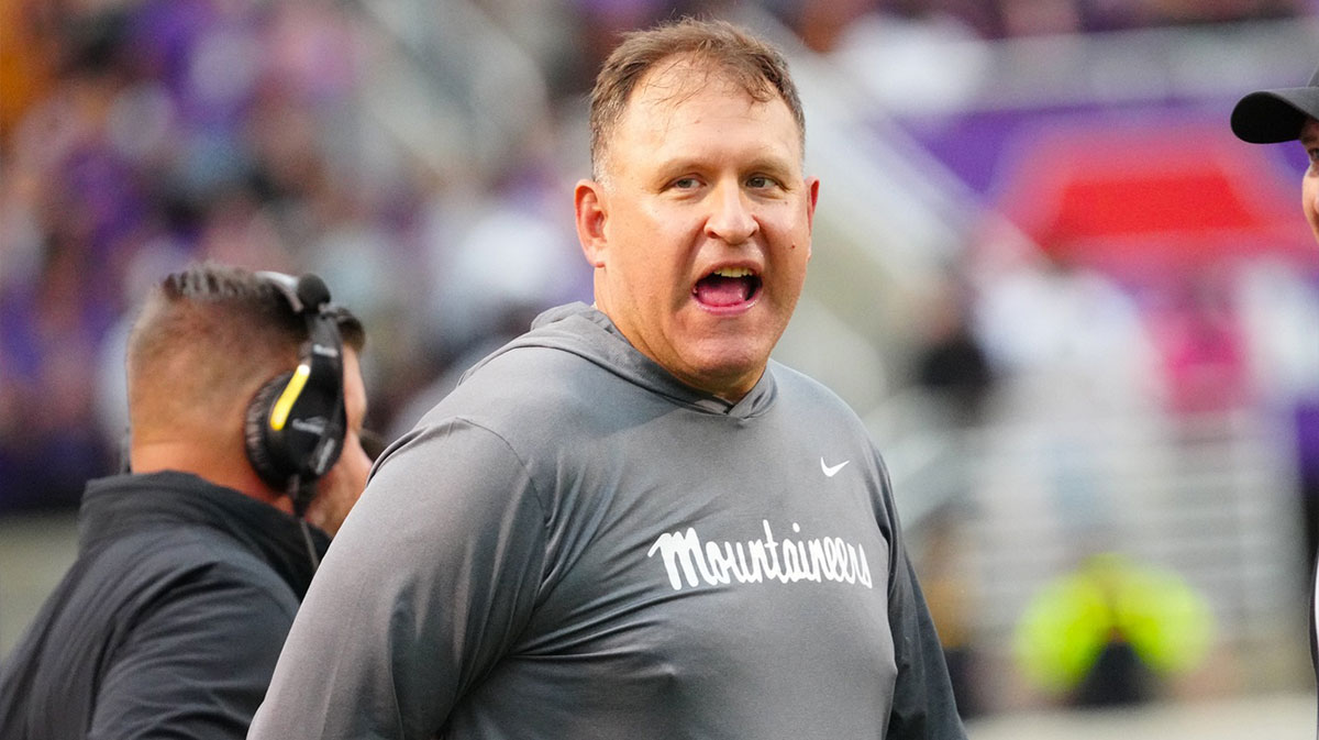 Appalachian State Mountaineers head coach Shawn Clark reacts to a call in the second half against the East Carolina Pirates at Dowdy-Ficklen Stadium.