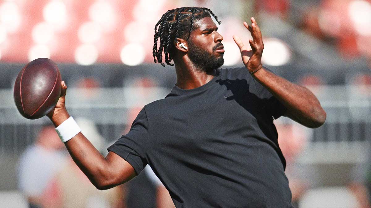 Cleveland Browns quarterback Shedeur Sanders (12) warms up before the game between the Browns and the Green Bay Packers at Huntington Bank Field.