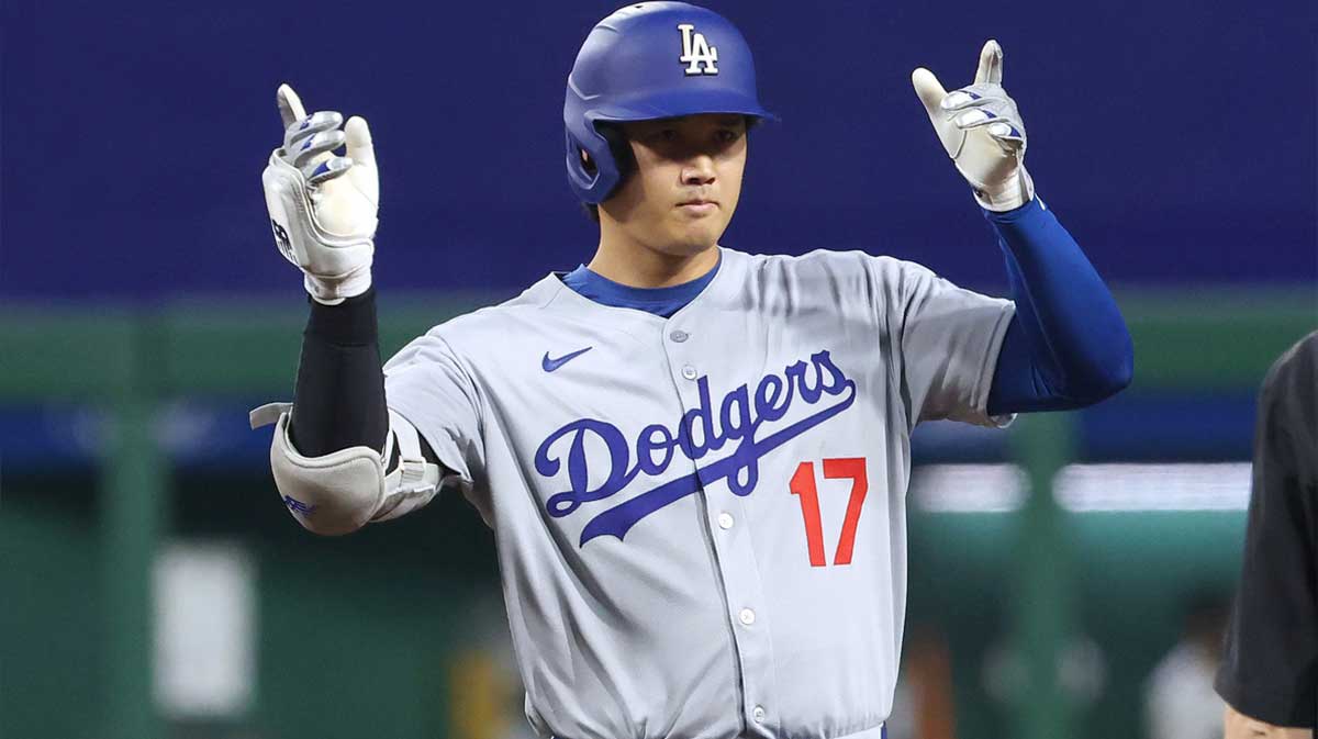 Los Angeles Dodgers two-way player Shohei Ohtani (17) reacts at second base after hitting a double against the Pittsburgh Pirates during the fifth inning at PNC Park.