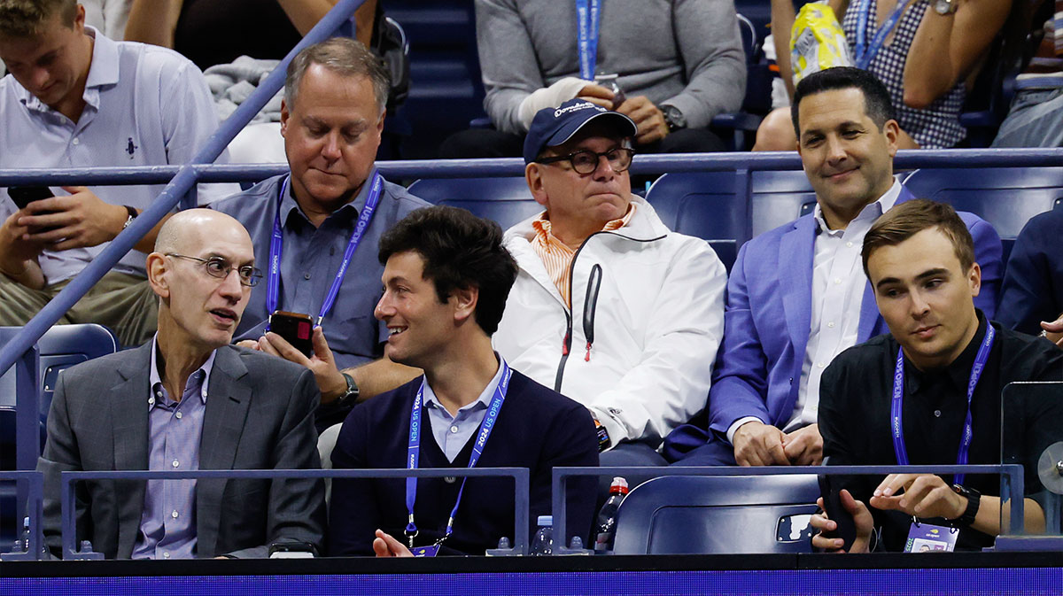 NBA commissioner Adam Silver (L) sits curtsied during the match between Taylor Fritz (USA) and Novak Djokovic (SRB) (both not pictured) on day ten of the 2025 US Open tennis championships at Billie Jean King National Tennis Center