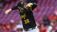 Pittsburgh Pirates starting pitcher Paul Skenes (30) pitches against the Cincinnati Reds in the first inning at Great American Ball Park.