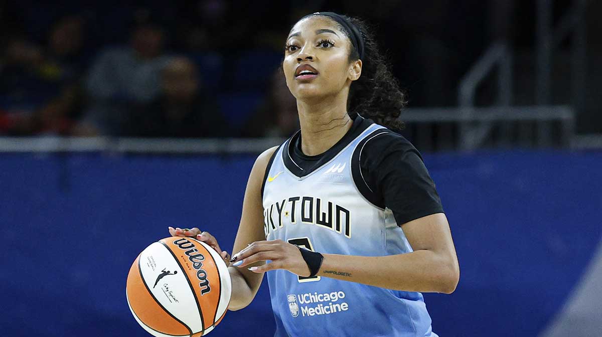 Chicago Sky forward Angel Reese (5) brings the ball up court against the Connecticut Sun during the second half at Wintrust Arena.