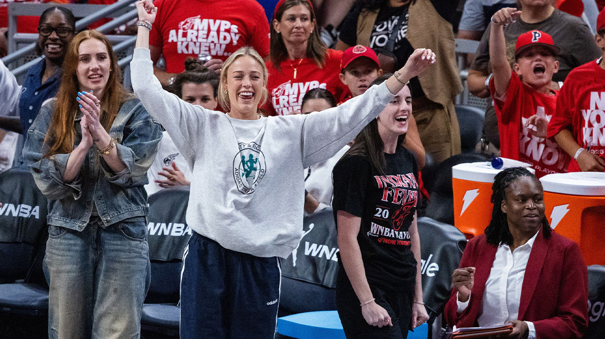 Indiana Fever guard Caitlin Clark (22) and guard Sophie Cunningham (8) on the sideline during game two of round one against the Atlanta Dream for the 2025 WNBA Playoffs at Gainbridge Fieldhouse.