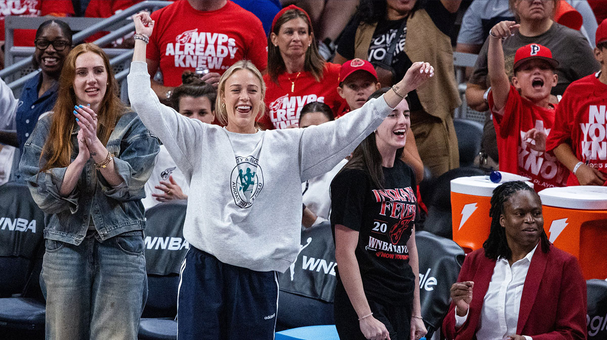 Indiana Fever guard Caitlin Clark (22) and guard Sophie Cunningham (8) on the sideline during game two of round one against the Atlanta Dream for the 2025 WNBA Playoffs at Gainbridge Fieldhouse.