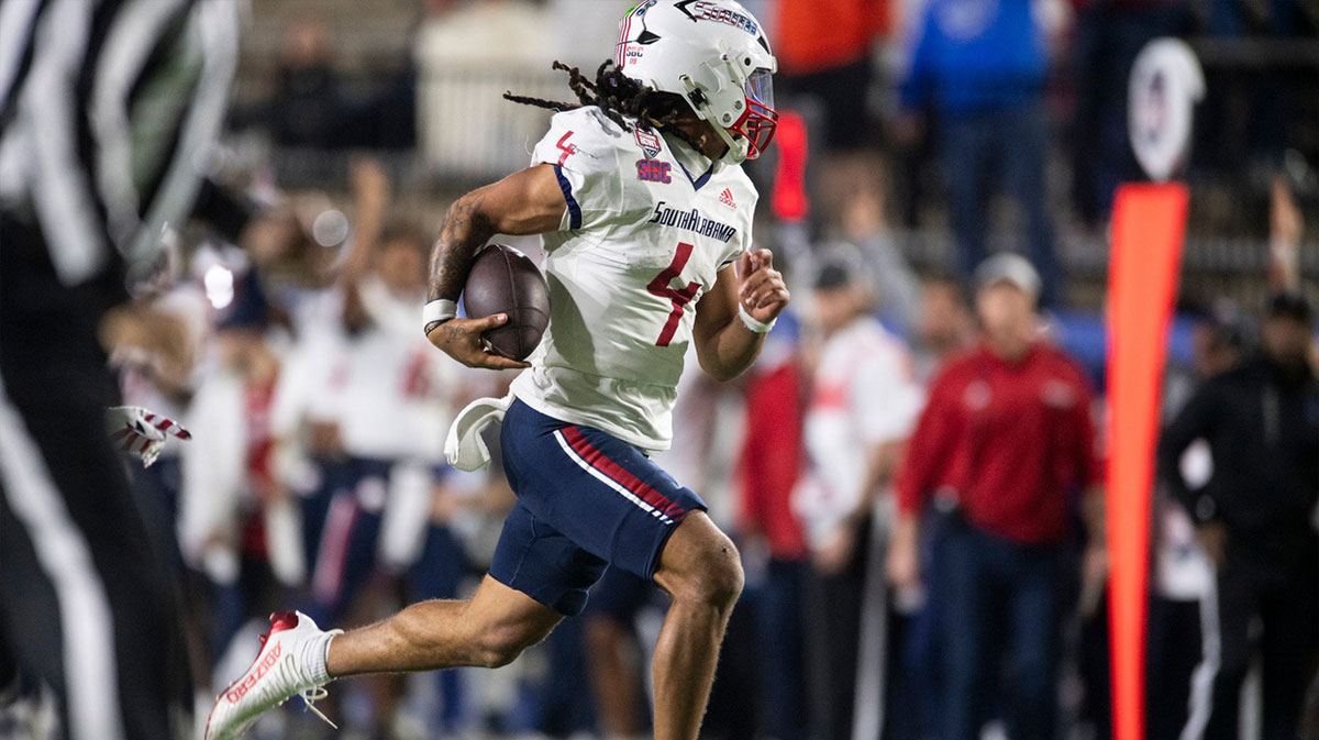 South Alabama Jaguars quarterback Bishop Davenport (4) breaks free for a touchdown run as South Alabama takes on Western Michigan during the IS4S Salute to Veterans Bowl at Cramton Bowl in Montgomery, Ala., on Saturday, Dec. 14, 2024. South Alabama Jaguars defeated Western Michigan Broncos 30-23.