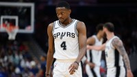 San Antonio Spurs guard De'Aaron Fox (4) looks on during the third quarter against the Washington Wizards at Capital One Arena.