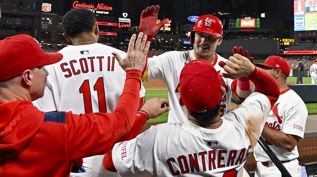 St. Louis Cardinals first baseman Willson Contreras (40) hits a two run triple against the Athletics during the eighth inning at Busch Stadium.