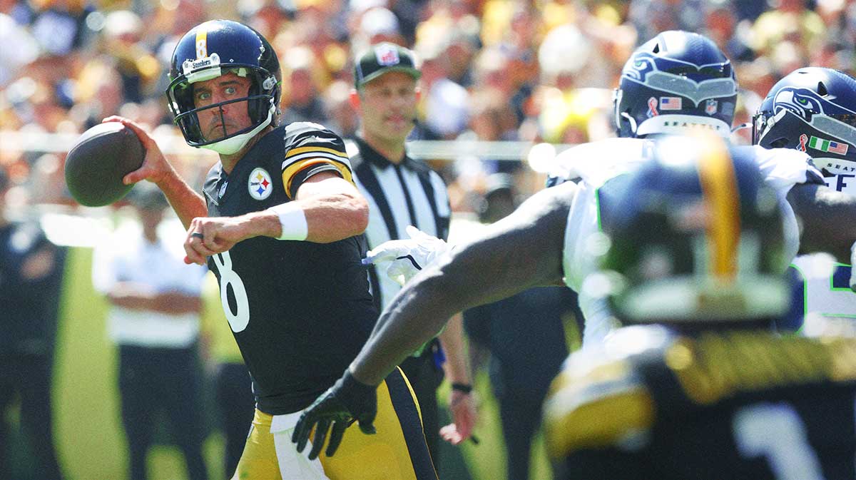 Pittsburgh Steelers quarterback Aaron Rodgers (8) passes against the Seattle Seahawks at Acrisure Stadium.