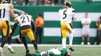 Steelers cornerback Jalen Ramsey (5) reacts after breaking up a pass intended for New York Jets wide receiver Garrett Wilson (5) during the fourth quarter at MetLife Stadium.