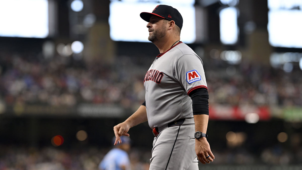 Cleveland Guardians manager Stephen Vogt (12) walks off the field during the game against the Texas Rangers at Globe Life Field.