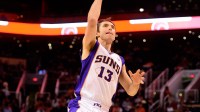 Phoenix Suns guard Steve Nash takes a shot in the second half against the Oklahoma City Thunder at the US Airways Center.