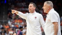 Auburn Tigers assistant coach Steven Pearl and head coach Bruce Pearl talk with their team from the bench as Auburn Tigers take on Ole Miss Rebels at Neville Arena in Auburn, Ala., on Wednesday, Feb. 26, 2025.