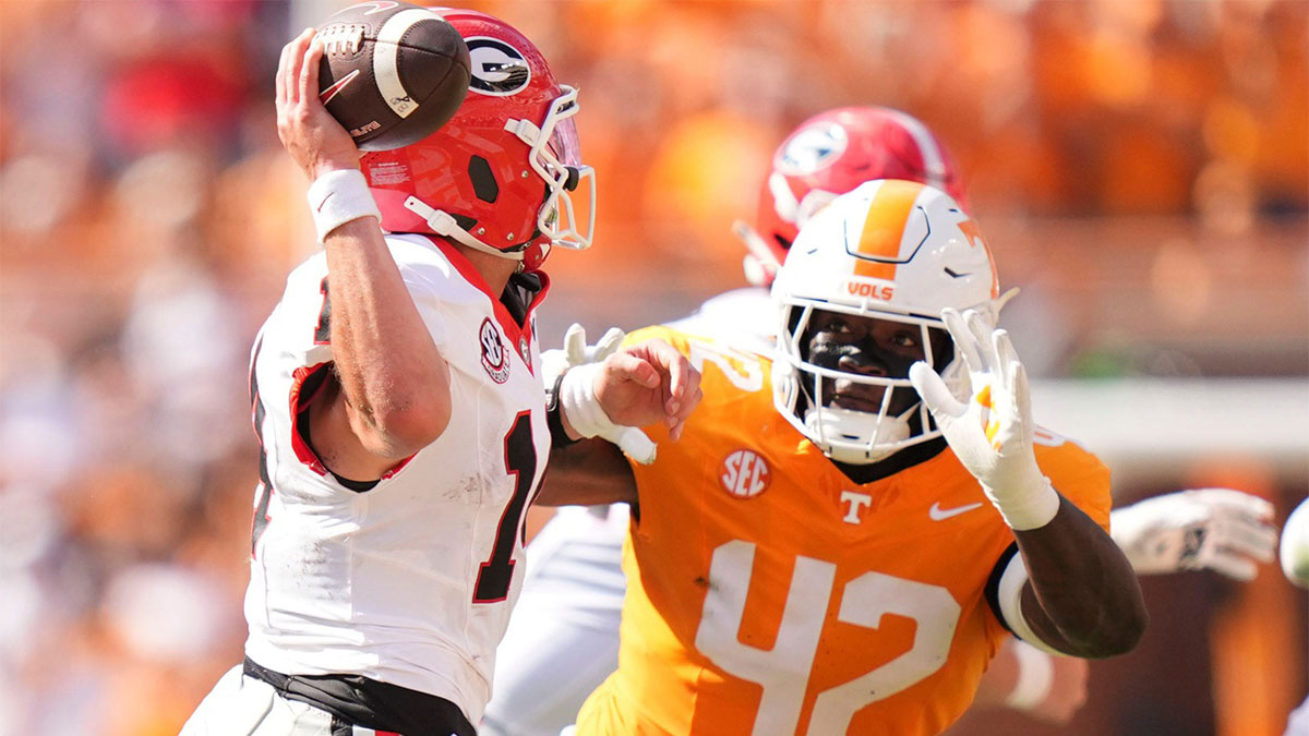 Tennessee defensive lineman Tyre West (42) pressures Georgia quarterback Gunner Stockton (14) during an NCAA college football game on September 13, 2025, Knoxville, Tennessee.
