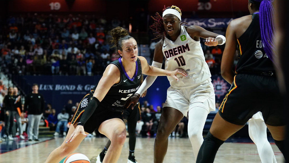 Connecticut Sun guard Marina Mabrey (3) drives the ball against Atlanta Dream guard Rhyne Howard (10) in the second half at Mohegan Sun Arena.