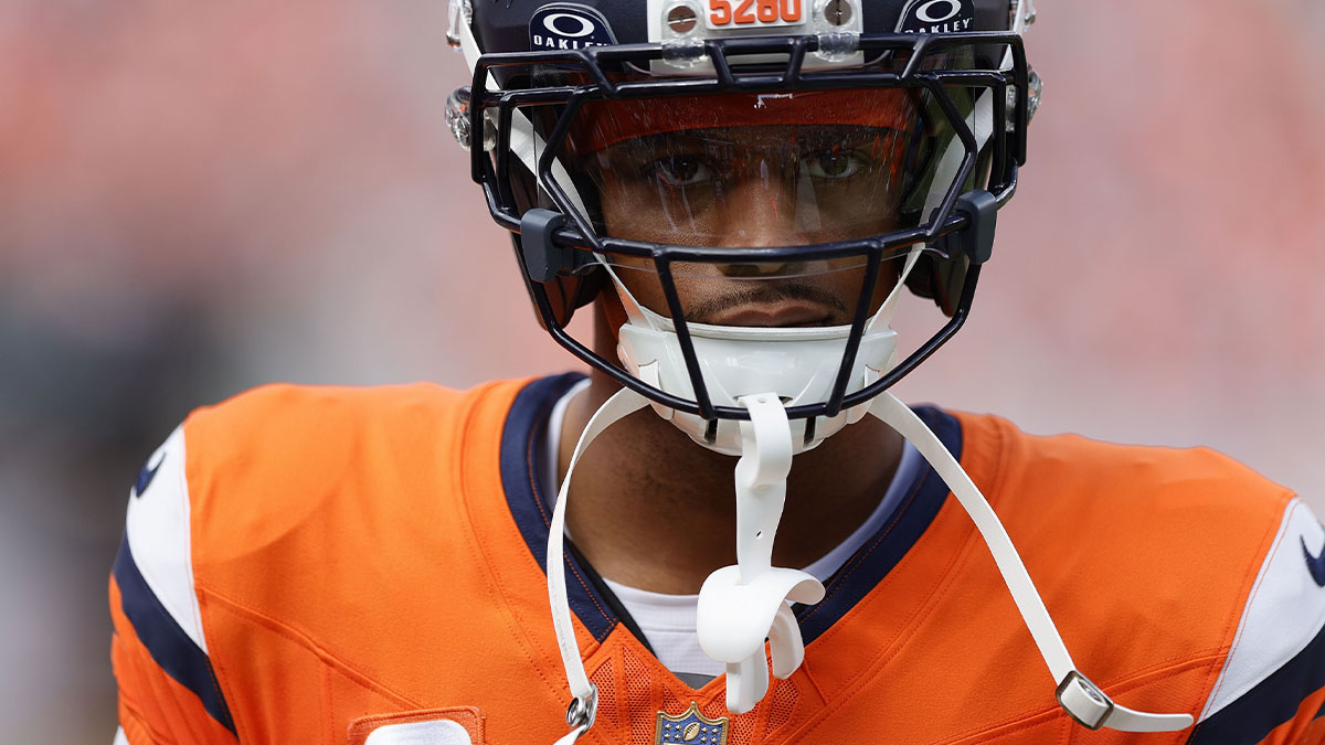 Denver Broncos cornerback Pat Surtain II (2) displays a gold shield logo patch on his uniform in the second half at Empower Field at Mile High.