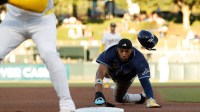 Tampa Bay Rays left fielder Chandler Simpson (14) advances to third base on a fly out by second baseman Brandon Lowe (8) during the first inning against the Athletics at Sutter Health Park.