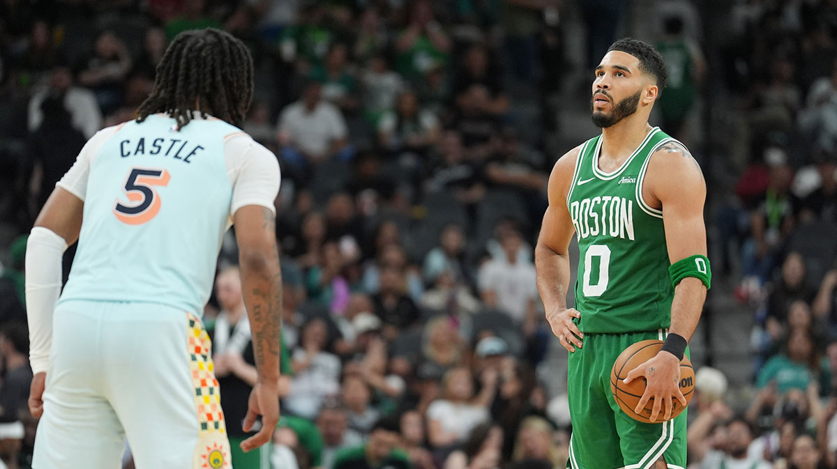 Boston Celtics forward Jayson Tatum (0) waits for the clock to run out in front of San Antonio Spurs guard Stephon Castle (5) in the second at Frost Bank Center.