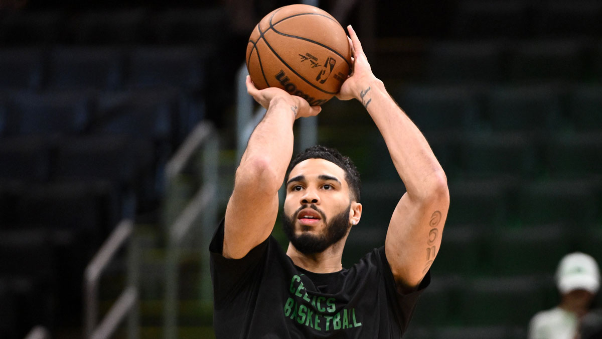 Boston Celtics forward Jayson Tatum (0) takes a shot during warmups before a game against the Atlanta Hawks at the TD Garden.