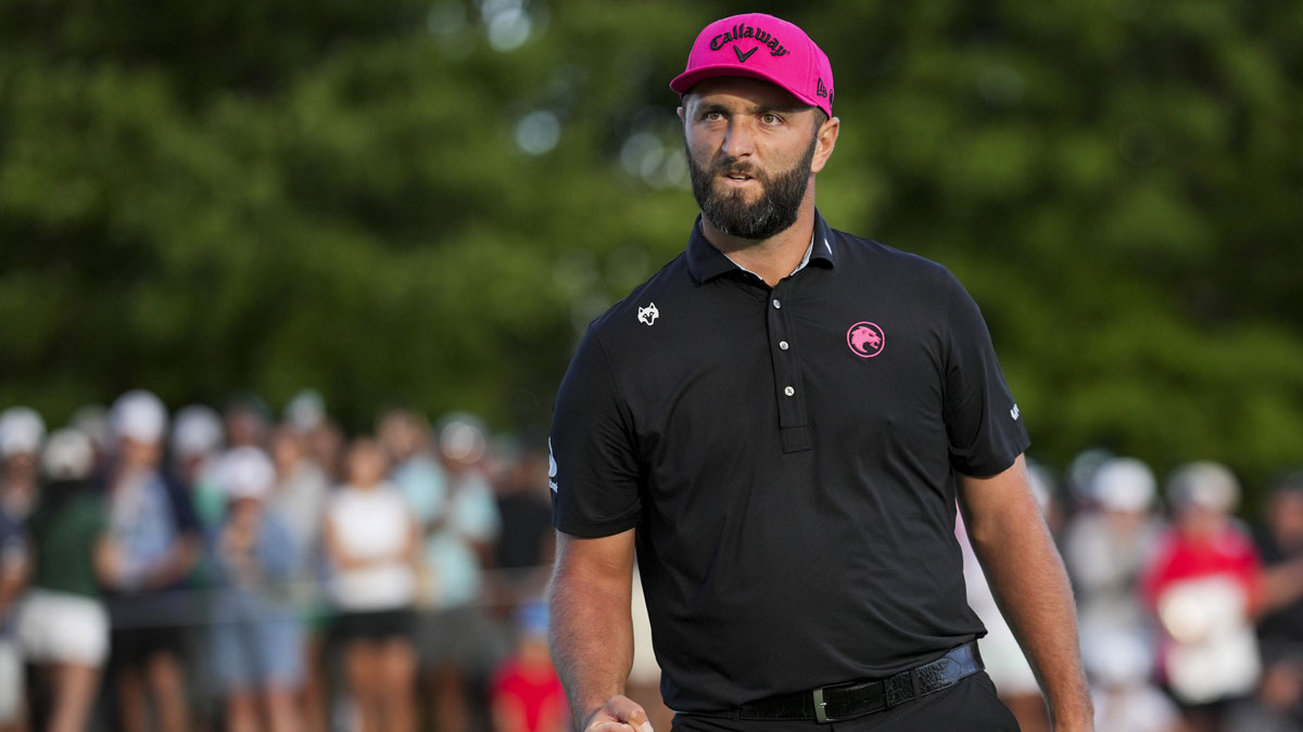 Jon Rahm of Legion XIII reacts to making his putt on the 18th green in a playoff hole during the finals of the LIV Golf Michigan Team Championship at The Cardinal at Saint John's Resort.