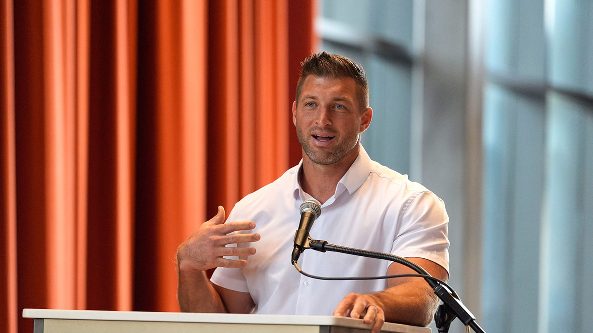 Tim Tebow, former NFL quarterback and Co-Owner of Augusta Pro Hockey, speaks during the announcement for Augusta Pro Hockey at the Bell Auditorium. ECHL hockey will return to Augusta for the 2027-2028 season.