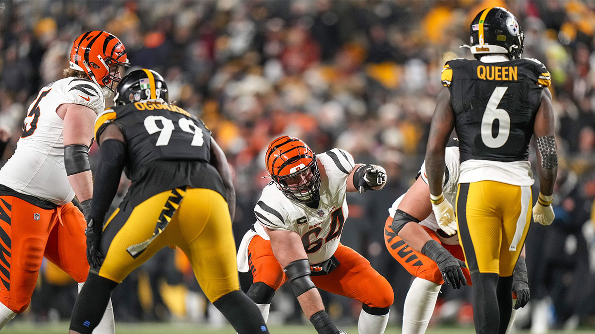 Cincinnati Bengals center Ted Karras (64) calls out the defense against the Pittsburgh Steelers in the fourth quarter at Acrisure Stadium.