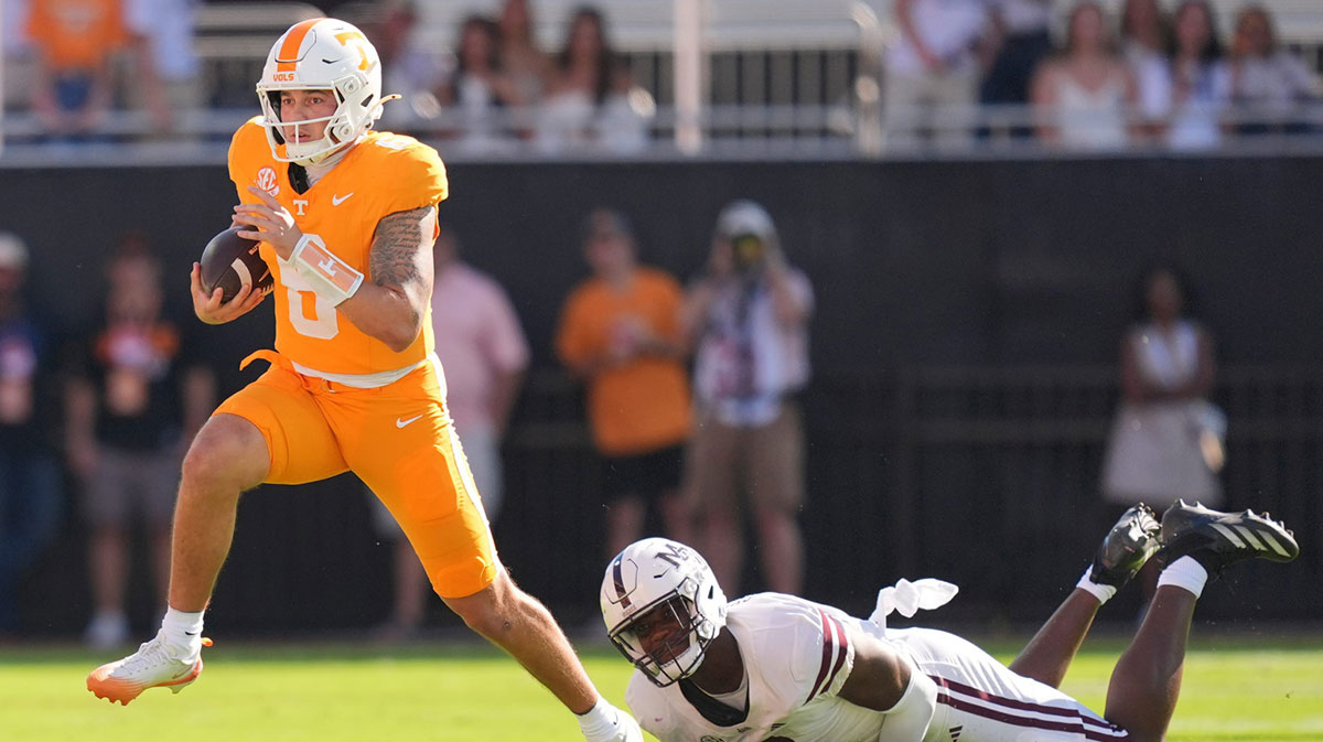 Tennessee quarterback Joey Aguilar (6) scrambles with the ball during a college football game between Tennessee and Mississippi State at Davis Wade Stadium in Starkville, Miss. 