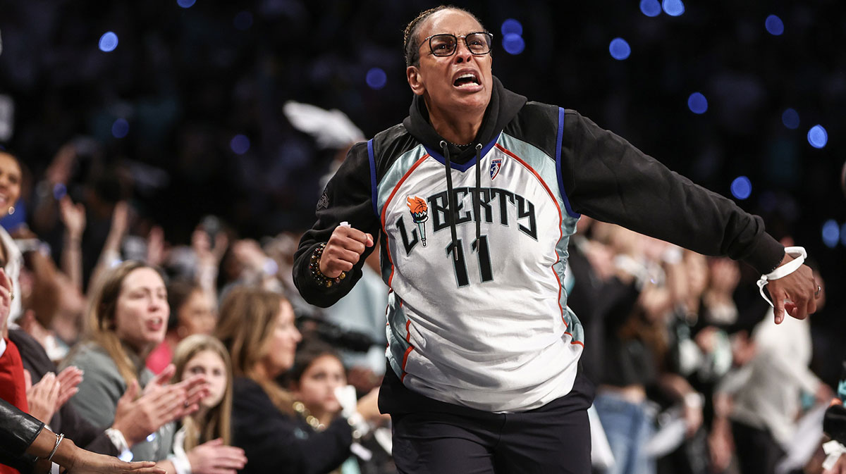 Former New York Liberty guard Teresa Weatherspoon celebrates during game five of the 2024 WNBA Finals at Barclays Center.