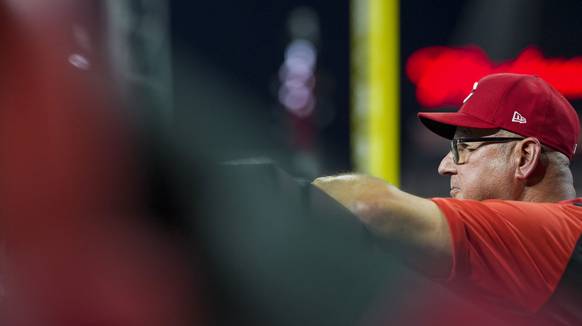 Cincinnati Reds manager Terry Francona (77) watches his team from the dugout in the game against the Chicago Cubs in the fifth inning at Great American Ball Park.
