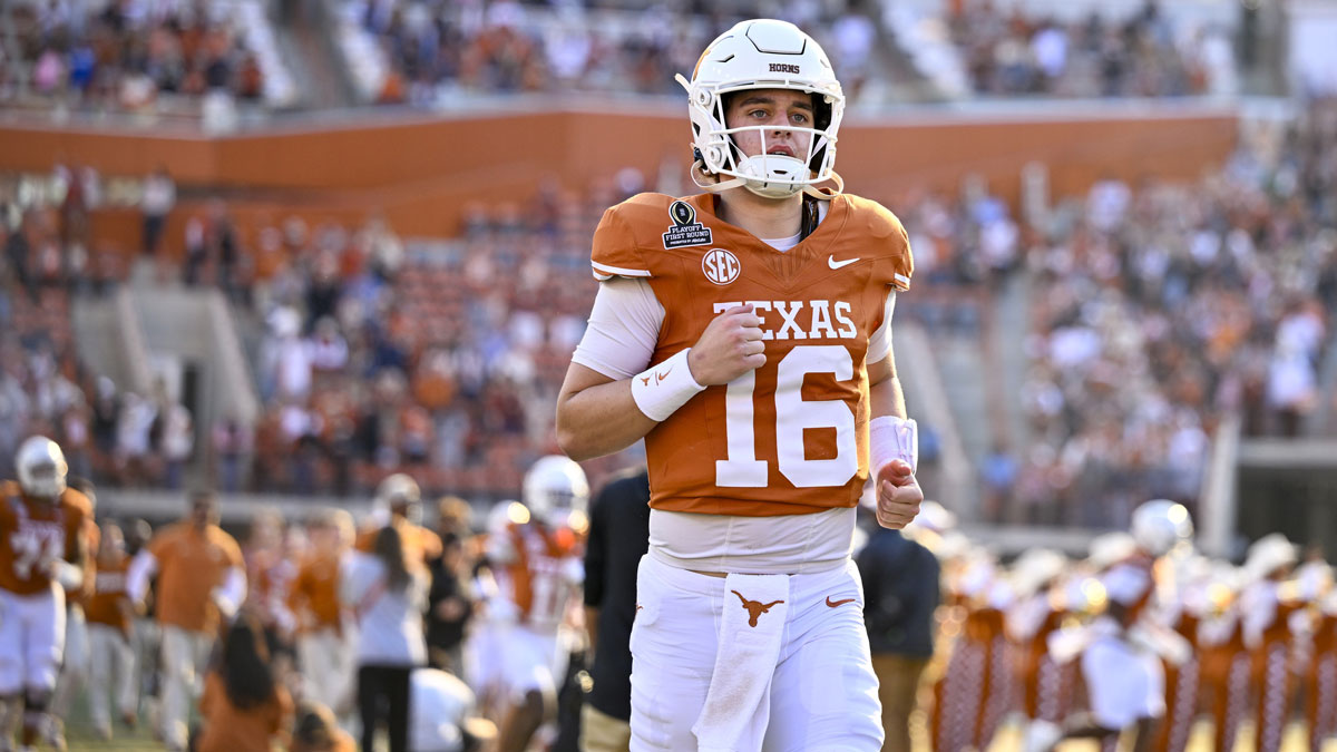 Texas Longhorns quarterback Arch Manning (16) takes the field before the game between the Texas Longhorns and the Clemson Tigers in the CFP National Playoff First Round at Darrell K Royal-Texas Memorial Stadium.