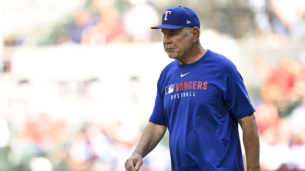 Texas Rangers manager Bruce Bochy (15) walks to the pitchers mound during the game against the Minnesota Twins at Globe Life Field.