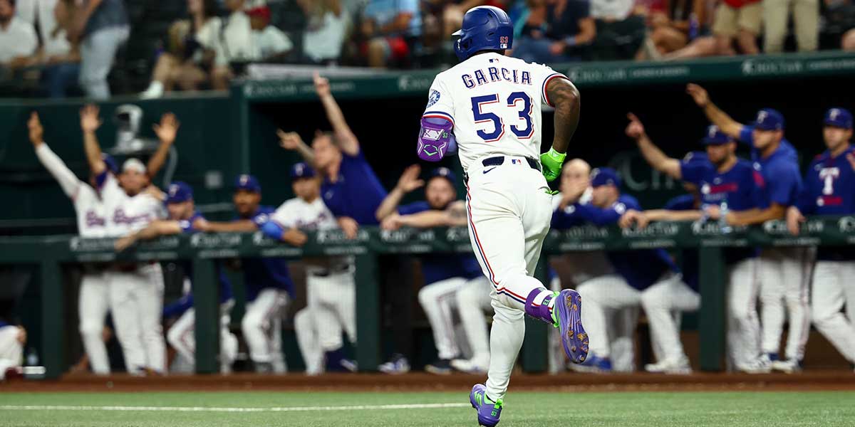 Texas Rangers right fielder Adolis Garcia (53) runs the bases after hitting a three-run home run during the first inning against the Los Angeles Angels at Globe Life Field.